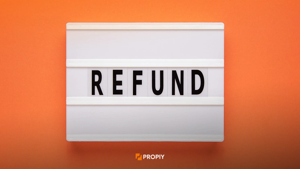 کلمه refund با رنگ مشکی در یک صفحه سفید